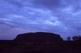 uluru (ayres rock) covered in a blanket of clouds