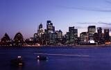 the sydney skyline and bridge after sunset, long exposure (blurred boats)